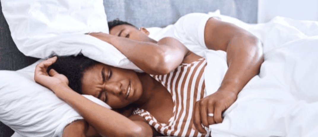 How To Sleep With Someone Who Snores?