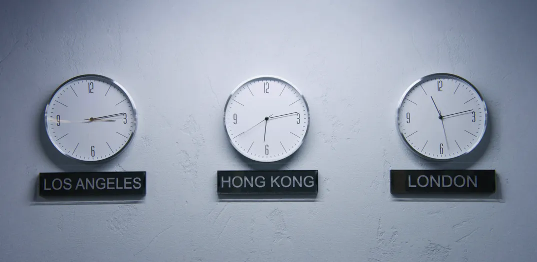 Clocks with different time zones, representing disruption of sleep caused by jet lag