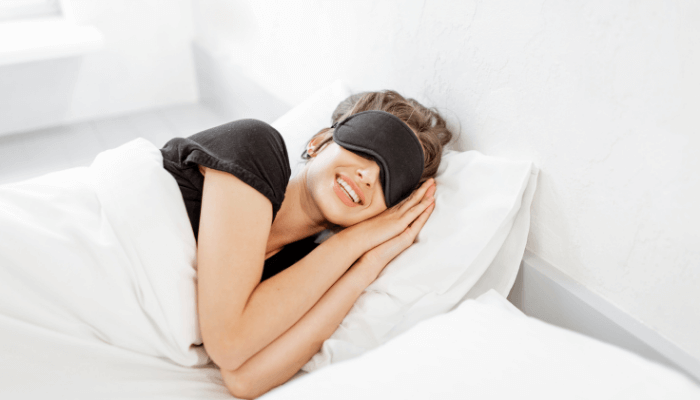 women sleeping with her eye covered