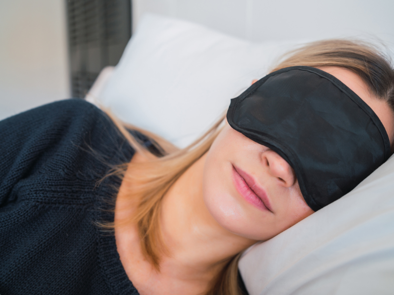 woman wearing sleep mask