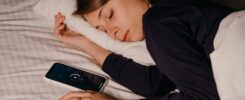 Pretty Woman Sleeping Beside Her Cellphone