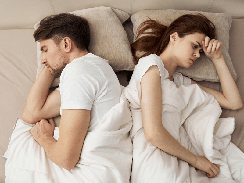 having your partner change their sleep position is one way to sleep with someone who snores