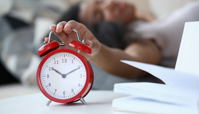 The best practice is maintaining regular sleep and wake times over the weekend