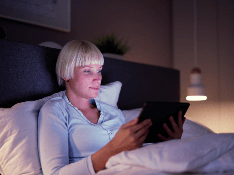 avoid using electronic devices, minimize blue light to help you sleep early