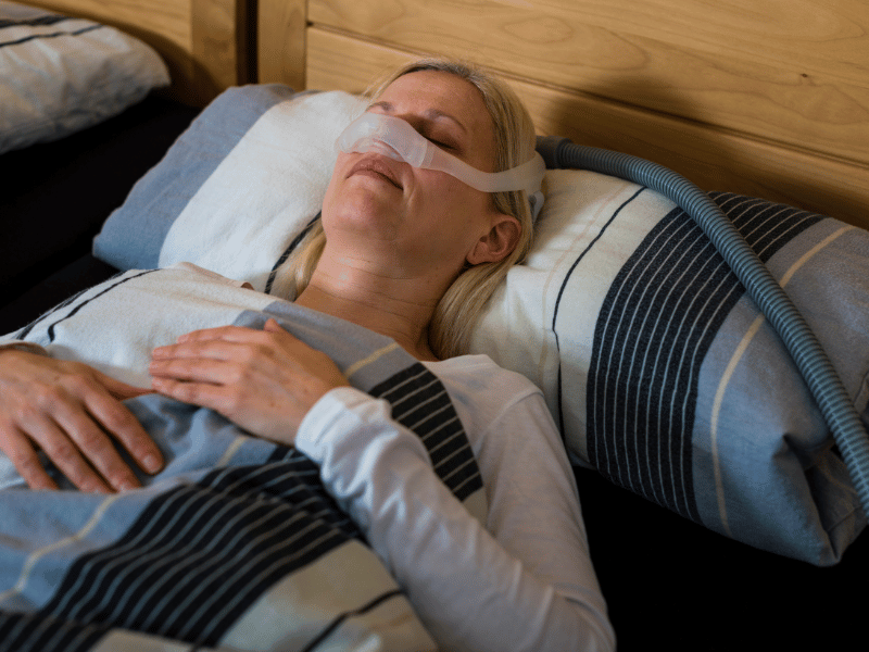 woman with cpap obstructive sleep apnea