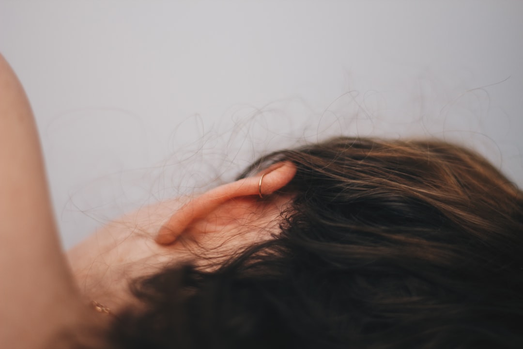 Should you sleep on the side of a ruptured eardrum?