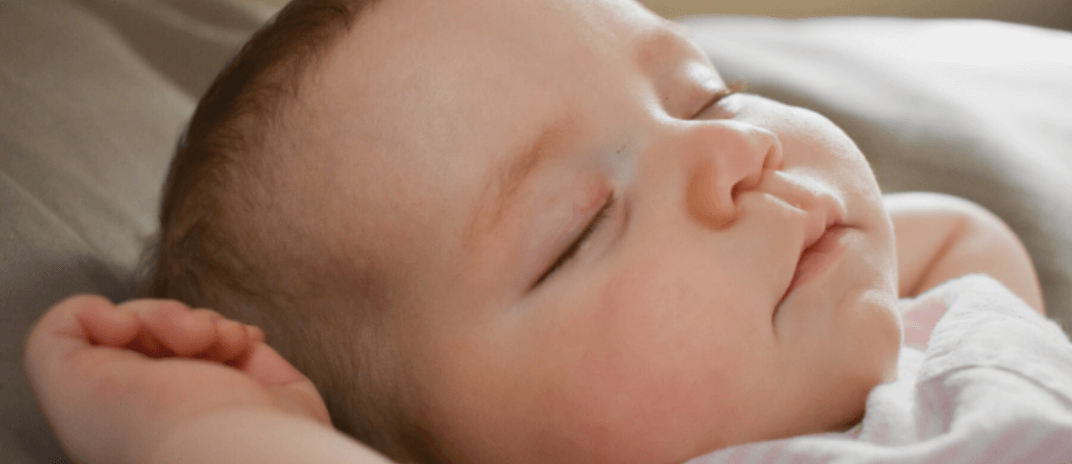 Why Do Babies Smile While Sleeping?