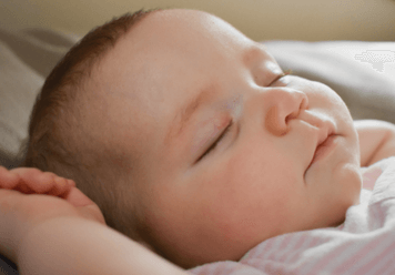 What Makes Babies Smile in Their Sleep?