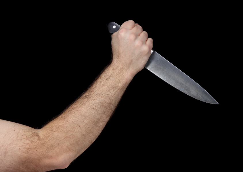 man holding knife 
dream about being stabbed