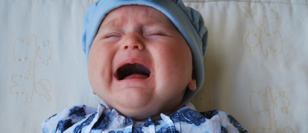 Baby Crying in Sleep: 6 Reasons and How To Soothe Them