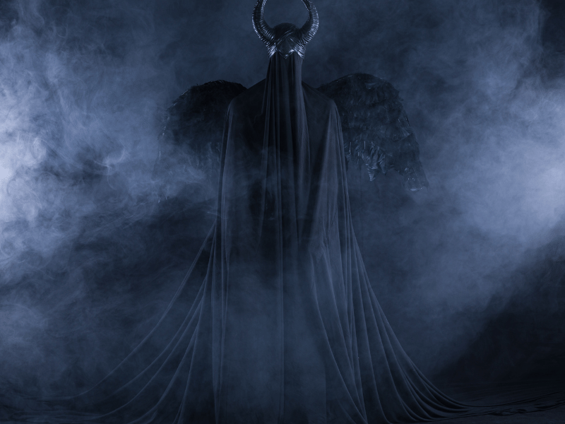 black demonic figure with horns representation