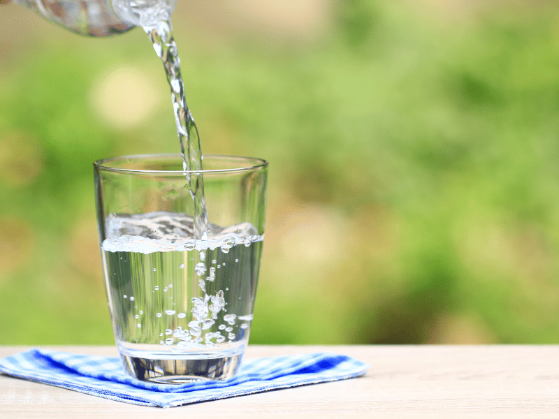water being poured into a glass, drink a glass of water in the morning 