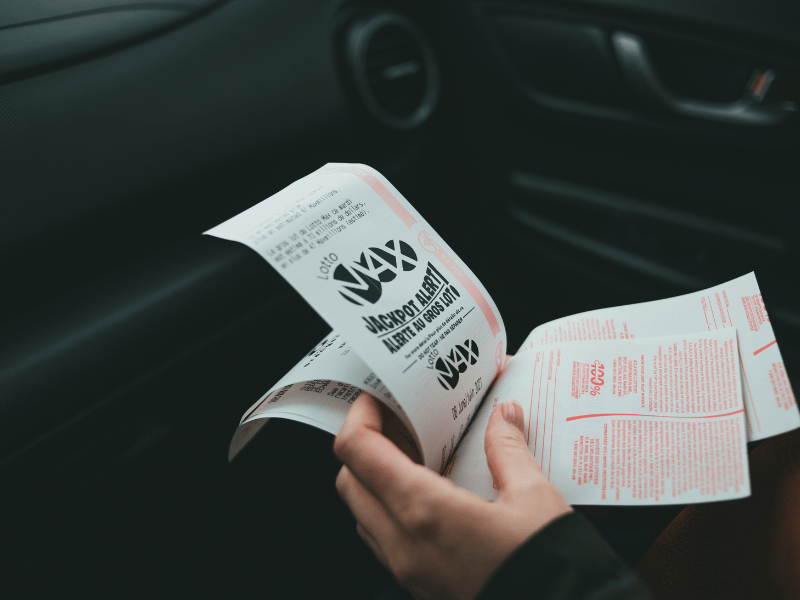 dream of hand holding onto ticket with specific numbers