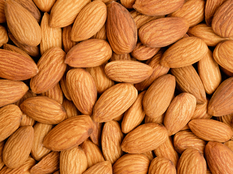 close up shot of a bunch of almonds which is high in magnesium