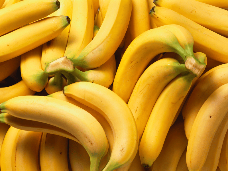 close up shot of multiple banana fruits that are high in magnesium